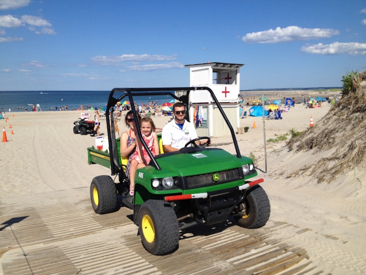 Chloe and I ride the Gator back to the parking lot after a day at Crane Beach. All of our beach supplies are loaded in the back, too! 